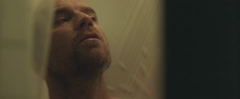 Movie still from “Zoe” (2018), directed by Drake Doremus – A person taking a shower; Extreme Close Up shot, Low angle