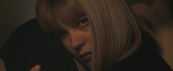 Movie still from “Zoe” (2018), directed by Drake Doremus – A person with long blonde hair; Close Up shot, Low angle