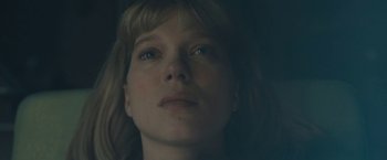 Movie still from “Zoe” (2018), directed by Drake Doremus – A woman's face in the dark; Close Up shot, Low angle