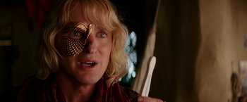 Movie still from “Zoolander 2” (2016), directed by Ben Stiller – A woman holding a spoon in her hand; Close Up shot, Over the shoulder angle