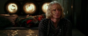 Movie still from “Zoolander 2” (2016), directed by Ben Stiller – A woman with a heart shaped eye patch on her face; Close Up shot, Over the shoulder angle