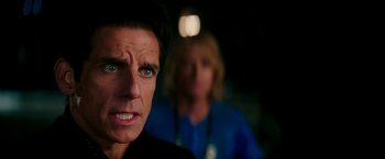 Movie still from “Zoolander 2” (2016), directed by Ben Stiller – A person with a person in the background; Close Up shot, Over the shoulder angle