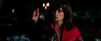 Movie still from “Zoolander 2” (2016), directed by Ben Stiller – A man and a woman are standing in the dark; Close Up shot, Over the shoulder angle