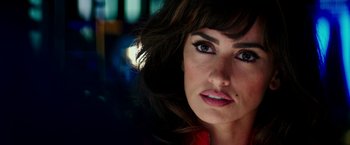 Movie still from “Zoolander 2” (2016), directed by Ben Stiller – A woman's face in a dark room; Close Up shot, Low angle