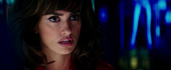 Movie still from “Zoolander 2” (2016), directed by Ben Stiller – A woman's face in front of a blue background; Close Up shot, Over the shoulder angle