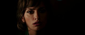 Movie still from “Zoolander 2” (2016), directed by Ben Stiller – A woman's face in the dark; Close Up shot, Over the shoulder angle