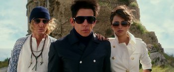 Movie still from “Zoolander 2” (2016), directed by Ben Stiller – A man and a woman wearing sun glasses; Close Up shot, Low angle