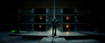 Movie still from “Zoolander 2” (2016), directed by Ben Stiller – A man standing in front of a ramp in a building; Wide shot, Low angle