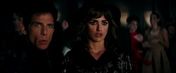 Movie still from “Zoolander 2” (2016), directed by Ben Stiller – A person wearing a hat; Close Up shot, Over the shoulder angle