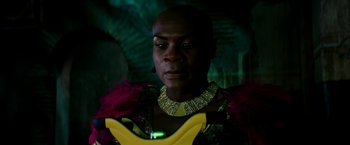 Movie still from “Zoolander 2” (2016), directed by Ben Stiller – A woman in a costume looking at the camera; Close Up shot, Low angle