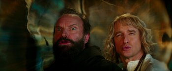 Movie still from “Zoolander 2” (2016), directed by Ben Stiller – A man and a woman looking surprised with one of them; Close Up shot, Low angle