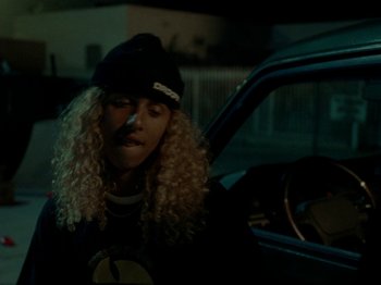 Movie still from “Mid90s” (2018), directed by Jonah Hill – A person sitting in the driver's seat of a car at night; Close Up shot, Over the shoulder angle