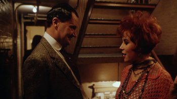 Movie still from “Bullets Over Broadway” (1994), directed by Woody Allen – A man and a woman talking to each other; Close Up shot, Over the shoulder angle