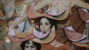 Movie still from “Bullets Over Broadway” (1994), directed by Woody Allen – A woman's face in a hat; Close Up shot, Low angle