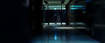 Movie still from “xXx: Return of Xander Cage” (2017), directed by D.J. Caruso – A man walking through a hallway in an office building; Wide shot, High angle
