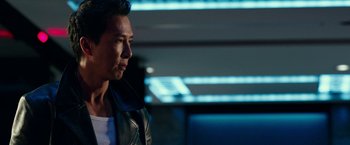 Movie still from “xXx: Return of Xander Cage” (2017), directed by D.J. Caruso – A person wearing a leather jacket; Close Up shot, Over the shoulder angle