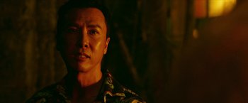 Movie still from “xXx: Return of Xander Cage” (2017), directed by D.J. Caruso – A person wearing a floral shirt; Close Up shot, Over the shoulder angle