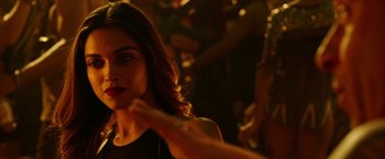 Movie still from “xXx: Return of Xander Cage” (2017), directed by D.J. Caruso – A person touching her hair; Close Up shot, Over the shoulder angle