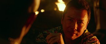Movie still from “xXx: Return of Xander Cage” (2017), directed by D.J. Caruso – A person wearing a hawaiian shirt; Close Up shot, Over the shoulder angle