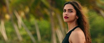 Movie still from “xXx: Return of Xander Cage” (2017), directed by D.J. Caruso – Deepika padukon in a black top and red lipstick; Close Up shot, Low angle