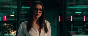 Movie still from “xXx: Return of Xander Cage” (2017), directed by D.J. Caruso – A woman wearing glasses and a white dress shirt; Close Up shot, Over the shoulder angle