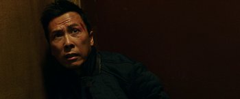 Movie still from “xXx: Return of Xander Cage” (2017), directed by D.J. Caruso – A man with a black jacket and a black shirt; Close Up shot, High angle