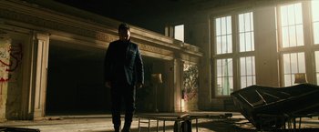Movie still from “xXx: Return of Xander Cage” (2017), directed by D.J. Caruso – A man standing in an empty room next to a window; Wide shot, Low angle