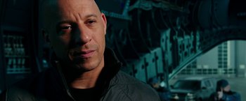 Movie still from “xXx: Return of Xander Cage” (2017), directed by D.J. Caruso – A person wearing a jacket; Close Up shot, Over the shoulder angle