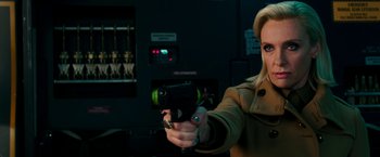 Movie still from “xXx: Return of Xander Cage” (2017), directed by D.J. Caruso – A woman is holding a gun in a room; Close Up shot, High angle