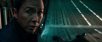 Movie still from “xXx: Return of Xander Cage” (2017), directed by D.J. Caruso – A man's face as he stands on the side of a road; Close Up shot, Low angle