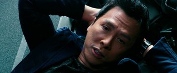 Movie still from “xXx: Return of Xander Cage” (2017), directed by D.J. Caruso – A person laying on the ground; Close Up shot, Overhead angle