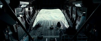 Movie still from “xXx: Return of Xander Cage” (2017), directed by D.J. Caruso – An inside view of an airplane looking out of the window; Extreme Wide shot, Low angle