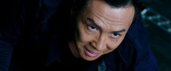Movie still from “xXx: Return of Xander Cage” (2017), directed by D.J. Caruso – A man's face with a scar on his face; Close Up shot, High angle