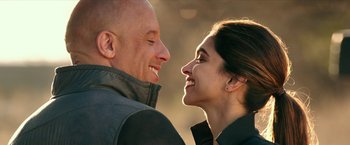 Movie still from “xXx: Return of Xander Cage” (2017), directed by D.J. Caruso – A man and a woman smiling at each other; Close Up shot, Over the shoulder angle