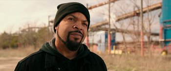 Movie still from “xXx: Return of Xander Cage” (2017), directed by D.J. Caruso – A person with a beard wearing a hat; Close Up shot, Over the shoulder angle