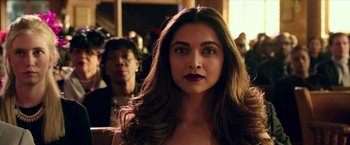 Movie still from “xXx: Return of Xander Cage” (2017), directed by D.J. Caruso – A person with long hair; Close Up shot, Over the shoulder angle