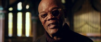 Movie still from “xXx: Return of Xander Cage” (2017), directed by D.J. Caruso – An older man wearing glasses and a brown jacket; Close Up shot, Low angle