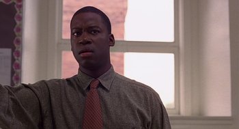 Movie still from “10 Things I Hate About You” (1999), directed by Gil Junger – A young man in a dress shirt and a tie; Close Up shot, Low angle