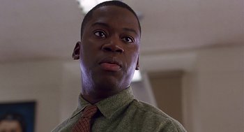 Movie still from “10 Things I Hate About You” (1999), directed by Gil Junger – A person wearing a shirt and a tie; Close Up shot, Low angle