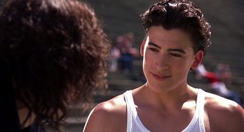 Movie still from “10 Things I Hate About You” (1999), directed by Gil Junger – A young man talking to another young man; Close Up shot, Over the shoulder angle