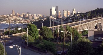 Movie still from “10 Things I Hate About You” (1999), directed by Gil Junger – A view of a city skyline from a distance; Extreme Wide shot, High angle