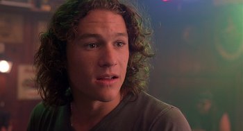 Movie still from “10 Things I Hate About You” (1999), directed by Gil Junger – A person with curly hair; Close Up shot, Low angle