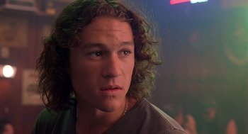 Movie still from “10 Things I Hate About You” (1999), directed by Gil Junger – A person with curly hair; Close Up shot, Low angle