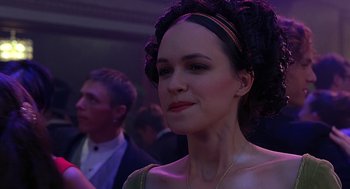 Movie still from “10 Things I Hate About You” (1999), directed by Gil Junger – A person wearing a dress; Close Up shot, Over the shoulder angle