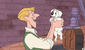 Movie still from “101 Dalmatians 2: Patch's London Adventure” (2002), directed by Brian Smith – A man holding a puppy in his hands; Medium shot, Over the shoulder angle
