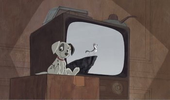Movie still from “101 Dalmatians 2: Patch's London Adventure” (2002), directed by Brian Smith – A dog sitting in front of a television with a mouse on it; Wide shot, Low angle