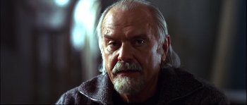 Movie still from “12” (2007), directed by Nikita Mikhalkov – An older man with a beard and a mustache; Close Up shot, Low angle