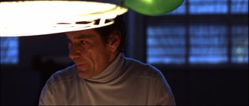 Movie still from “12” (2007), directed by Nikita Mikhalkov – A person wearing a white shirt; Close Up shot, Low angle