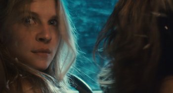 Movie still from “127 Hours” (2010), directed by Danny Boyle – A person with long hair; Close Up shot, Over the shoulder angle