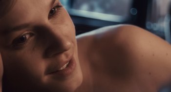 Movie still from “127 Hours” (2010), directed by Danny Boyle – A woman's face and her eyes; Close Up shot, Over the shoulder angle